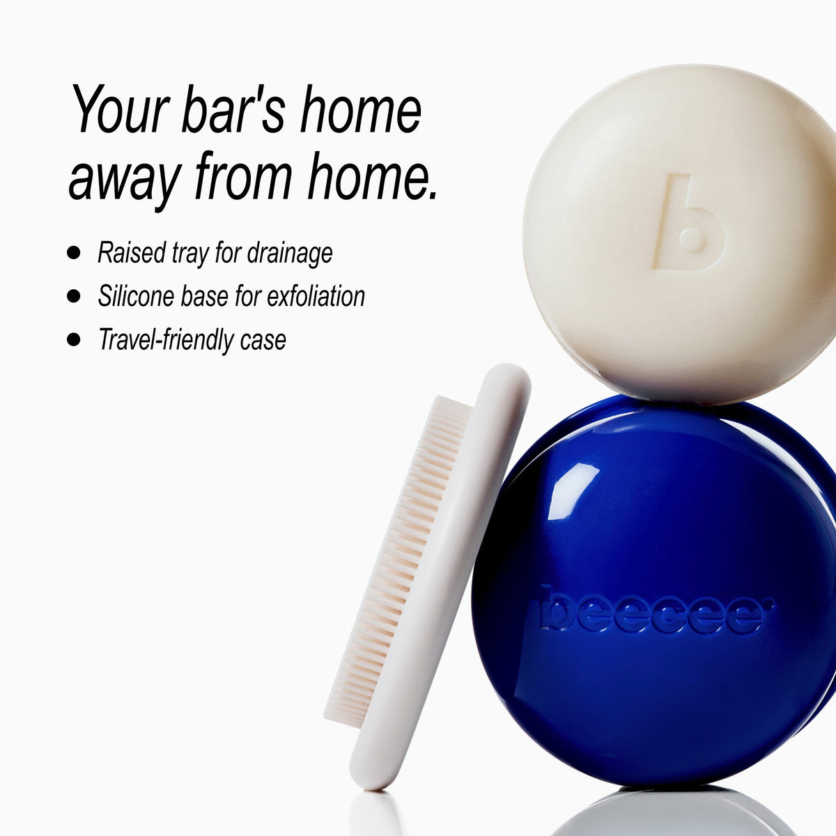 Beecee exfoliating bar set featuring a deep blue round container, a cream-colored exfoliating bar with a 'b' logo, a white silicone scraper brush, and a raised drainage tray, set against a clean white background with promotional text.