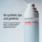 A close-up of a beecee Superfine Mist spray bottle with water droplets spraying from the nozzle, set against a light gray background with promotional text on the left.