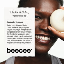 A smiling woman holds a round beige cleansing bar against her face next to a white text card detailing the 'Well-Rounded Bar' by beecee. 