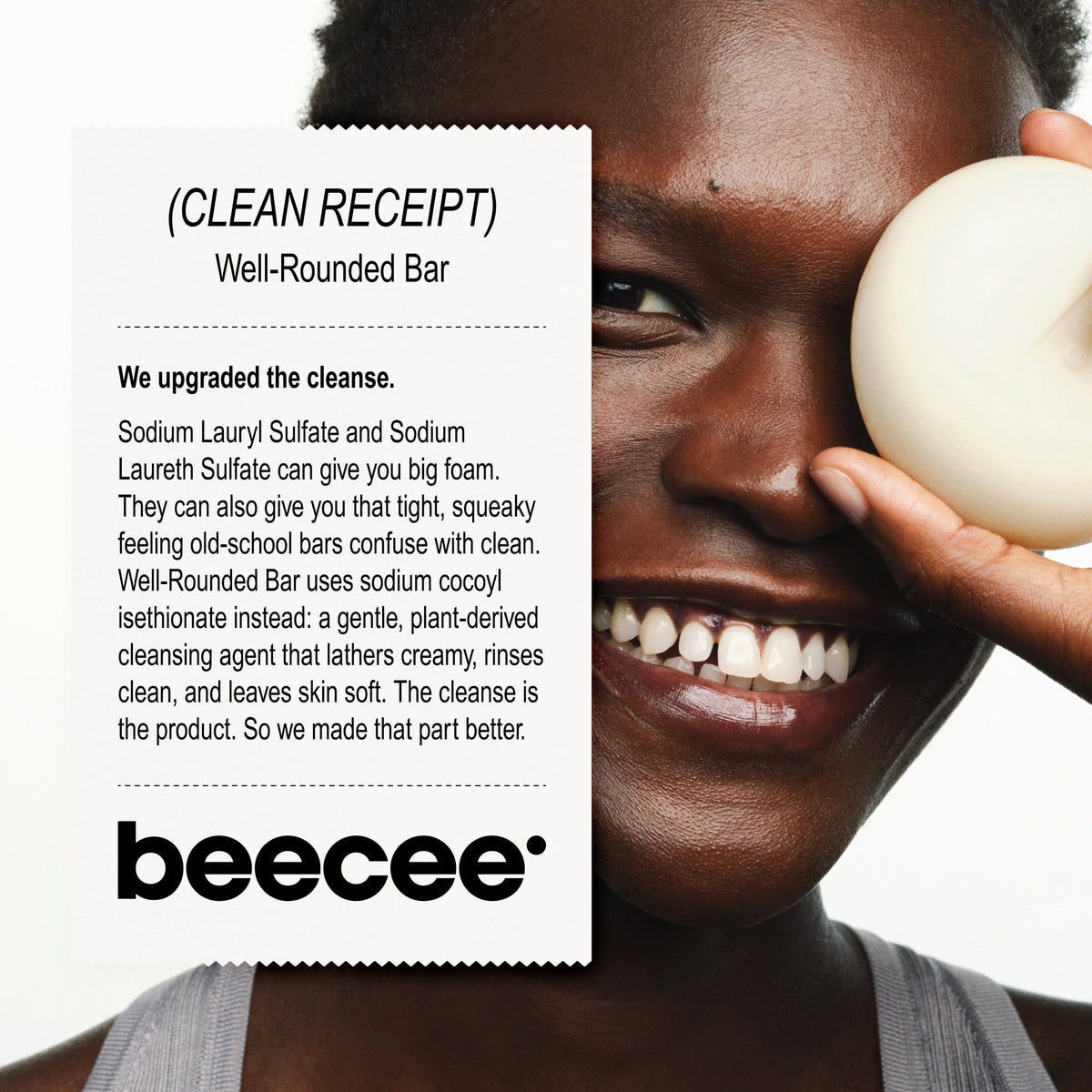 A smiling woman holds a round beige cleansing bar against her face next to a white text card detailing the 'Well-Rounded Bar' by beecee.