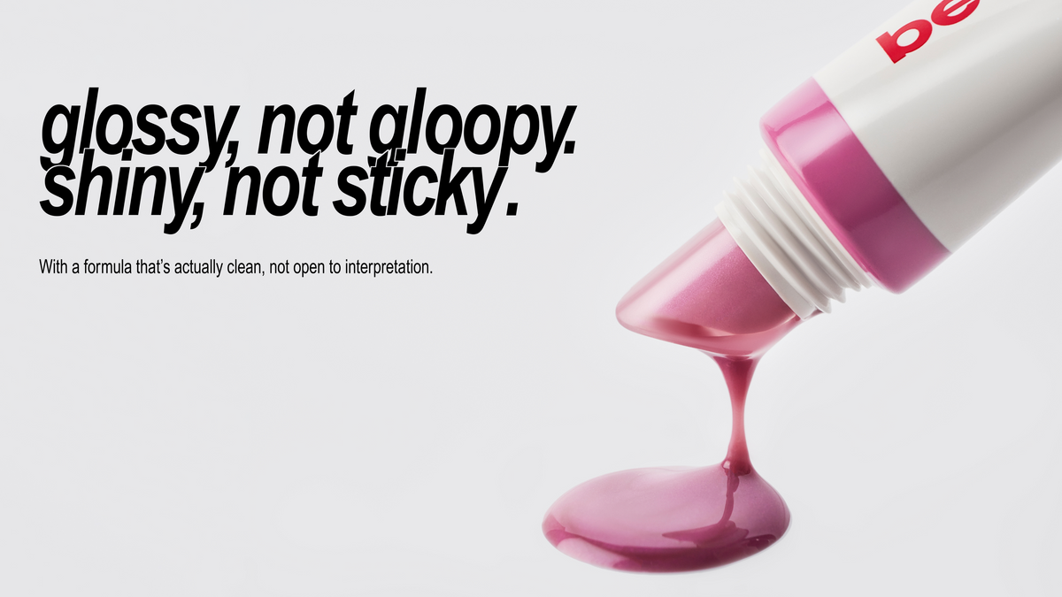 Jelly Gloss dripping from its squeeze tube. Text: Glossy, not gloopy. Shiny, not sticky.